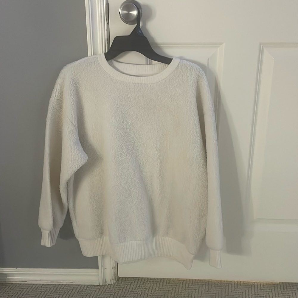 Large, white crewneck, fluffy material